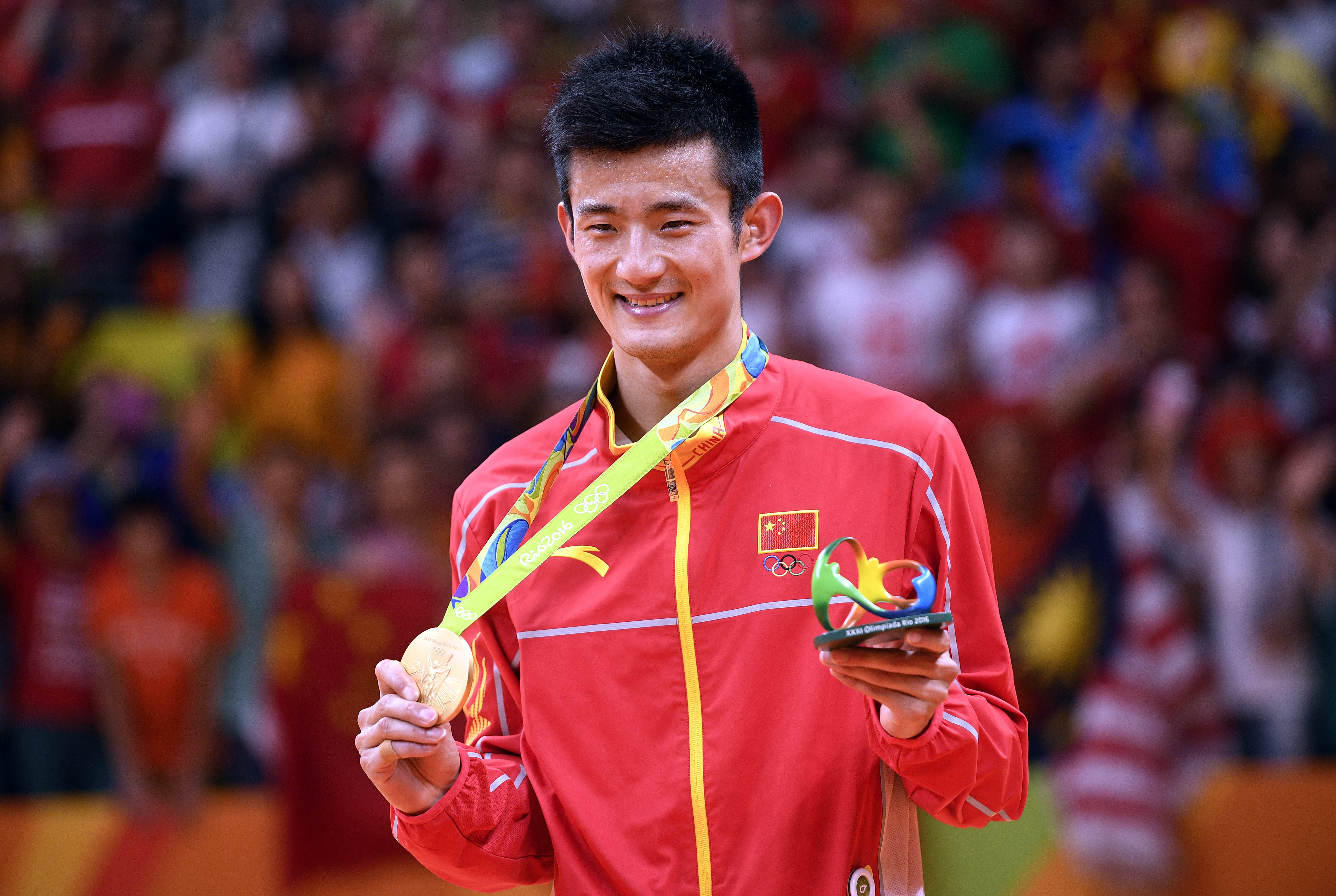 开云体育中国-韩国羽毛球队轻取日本羽毛球队，谌龙高光表现